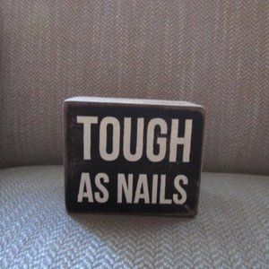 “Tough as nails” wood sign